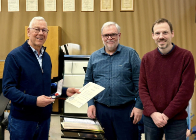 de Claude huet eng Medaille kritt fir 25 Joer USMVL